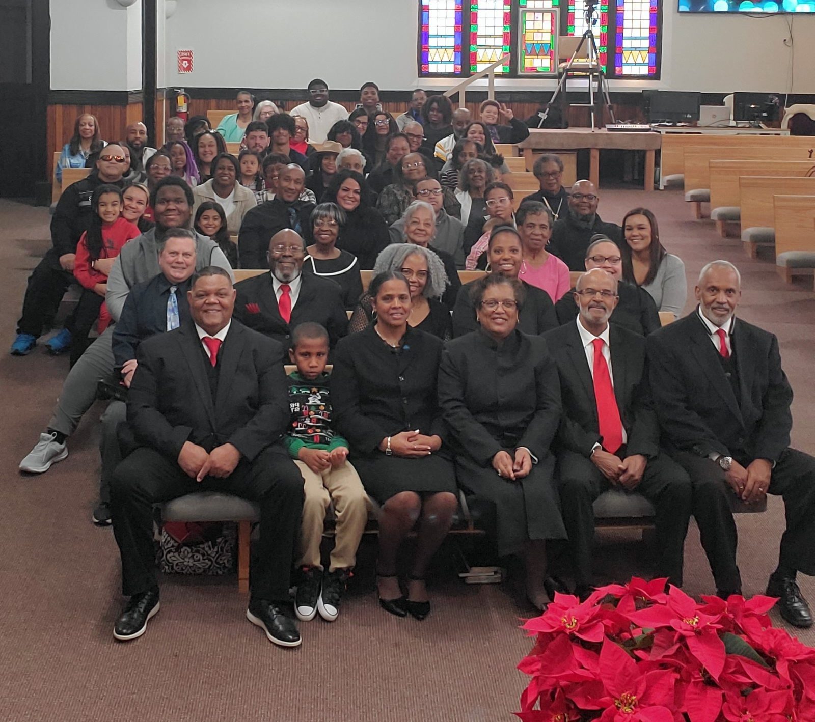 The congregation of Mt. Olive Baptist Church gathered in the sanctuary with Pastor Anita Lovell seated in the front row