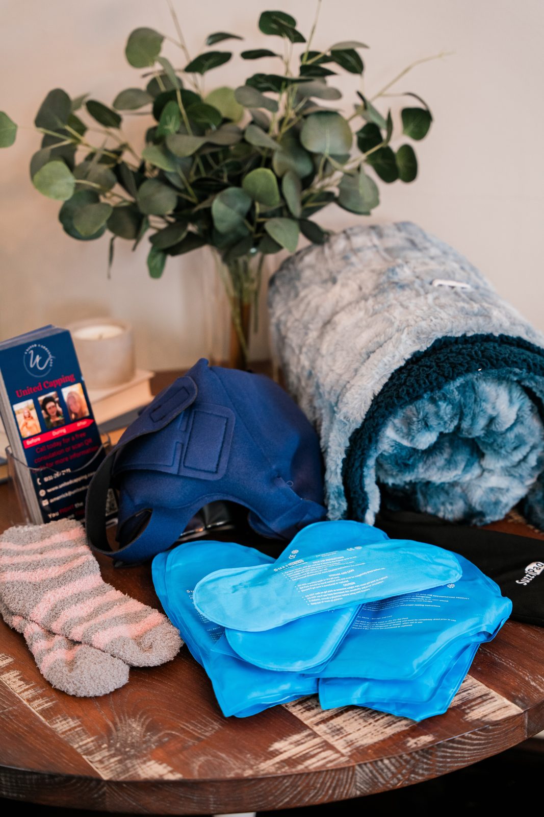 United Capping cold cap kit with gel caps, a blanket and cozy socks