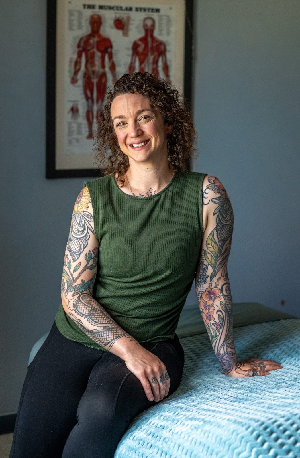 Jeanette Lamonde, founder of Inner Roots Wellness, in her massage treatment room