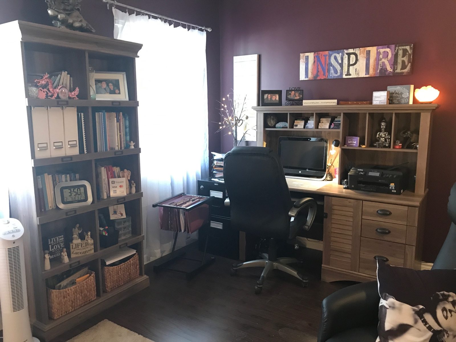 Maria DeRubeis's office at Passages - Pathway to Healing, with an Inspire sign above the desk