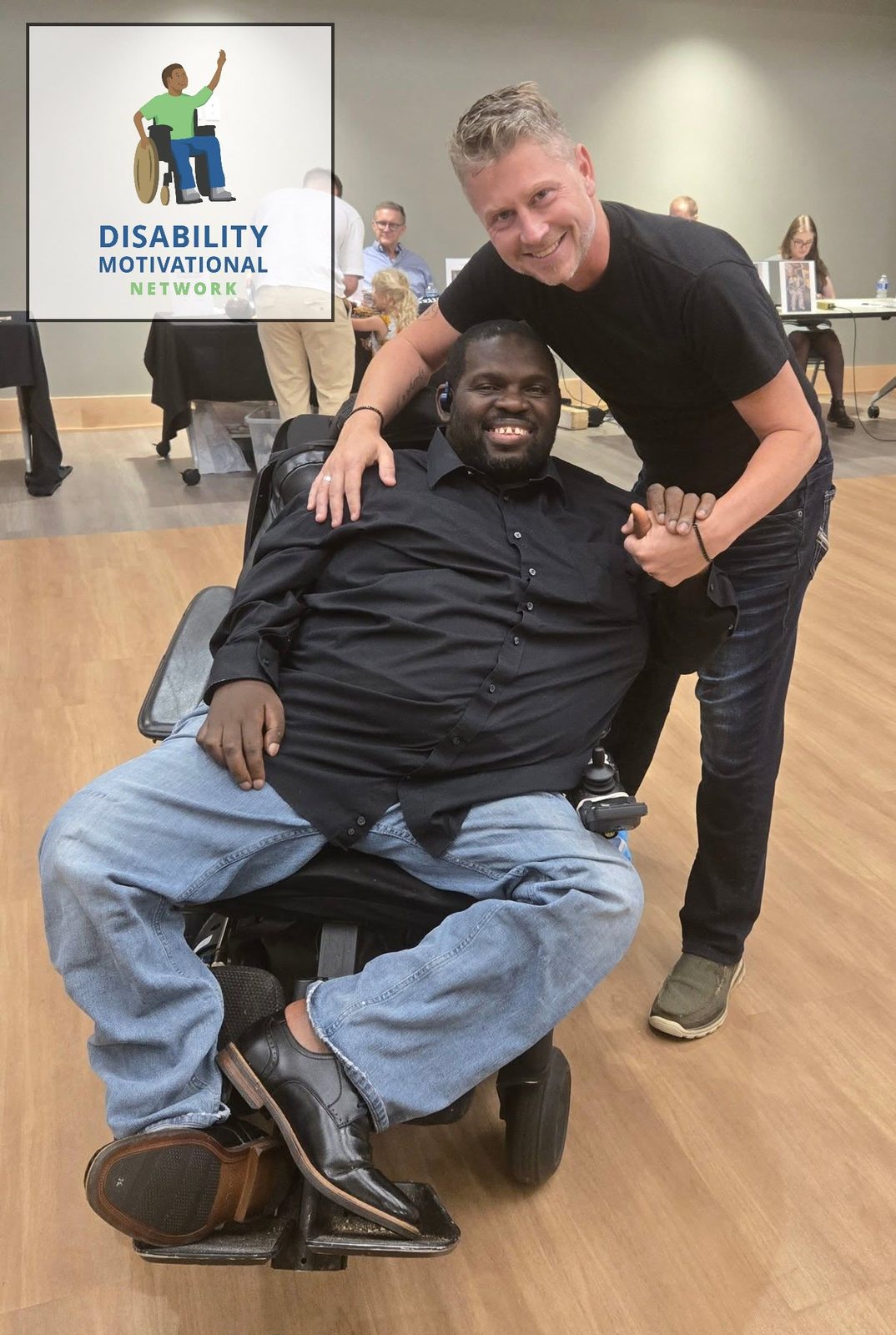 Paul McLellan with Prince Cole of Disability Motivational Network at a community event