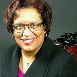 Pastor Anita Lovell of Mt. Olive Baptist Church in Canonsburg, Pennsylvania, smiling in a black jacket