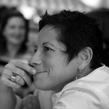 Emily Goldstein, owner of m design in Baltimore, in a black and white profile portrait with her chin resting on her hand