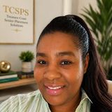 Faith-Marie Griffiths, founder and president of Treasure Coast Caregiver Workforce Foundation Inc., smiling in her office