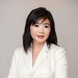 Ginger King, cosmetic chemist and founder of Grace Kingdom Beauty, known as The Beauty Shark, in a cream blazer