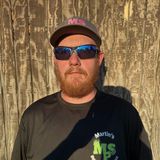 Michael Martin, founder of Martin's Property Solutions, in a black MPS shirt, cap and sunglasses